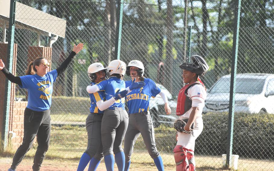 Wiesbaden celebrates a home run from Kyra Cole on Thursday, May 22, 2025, at the DODEA-Europe Division I softball championships at Ramstein Air Base, Germany.
