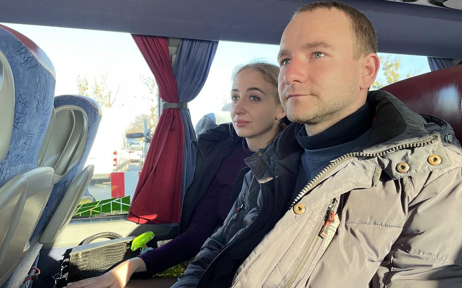Dmytro Hutsalov and his wife, Tatiana sit aboard a bus in Przemysl, Poland, bound for Denmark. 