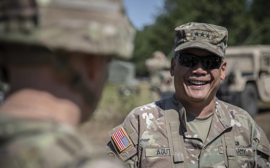 Army Lt. Gen. Antonio Aguto Jr., head of the First U.S. Army headquarters at Rock Island Arsenal in Illinois, visits the 77th Sustainment Brigade, during an exercise at  Fort McCoy, Wis., on Aug. 10, 2022. Aguto is regarded as a top candidate to lead a new Army headquarters in Germany that will coordinate security assistance for Ukraine.