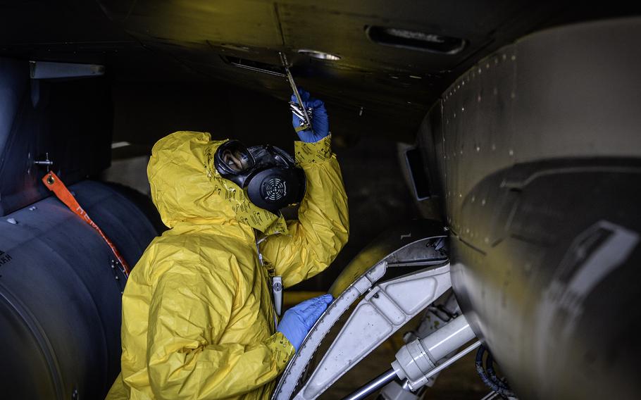 Tech. Sgt. Kayla Bradford inspects an access door on an F-16 Fighting Falcon during an exercise April 24, 2024, at Spangdahlem Air Base, Germany. Bradford is a phase inspection dock chief with the 480th Fighter Generation Squadron.