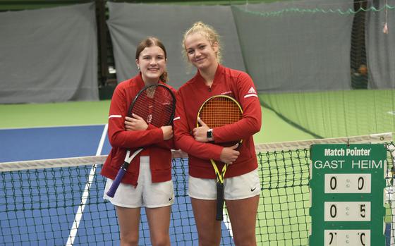 Kaiserslautern's Abigail Hover, left, and Stella Schmitz smile after winning the girls doubles title at the DODEA-Europe tennis championships Saturday, Oct. 21, 2021.