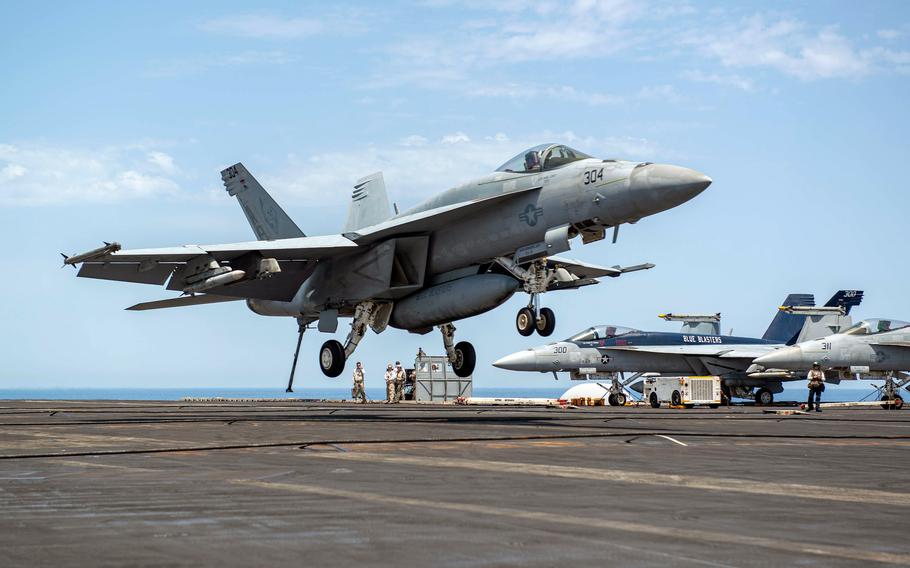An F/A-18E Super Hornet lands on the flight deck of USS Harry S. Truman on June 15, 2022. No decision has yet been made on whether a Navy Super Hornet that was blown off the carrier’s deck two weeks ago in the Mediterranean Sea will be recovered.