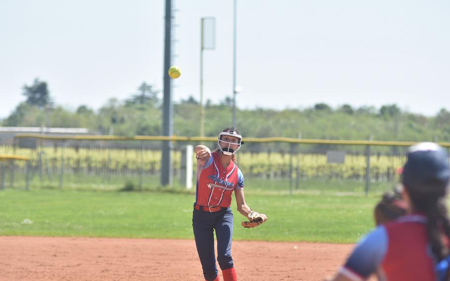 Aviano shortstop Jazmyn Warren throws towards first place Saturday, April 13, 2024, in the Saints’ doubleheader loss to the Naples Wildcats.