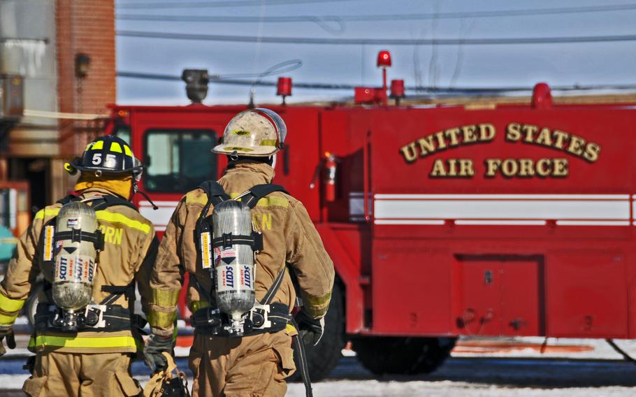 Members of the Niagara Falls Air Reserve Station Fire Department assist local first responders during a fire and hazardous waste incident at Saint-Gobain Ceramic Materials, Feb. 4, 2011, in Wheatfield, N.Y. A federal investigation found officials with the Niagara Falls Air Reserve Station’s fire department filed falsified firefighting and safety training records, crediting employees for training they never received over a three-year period.