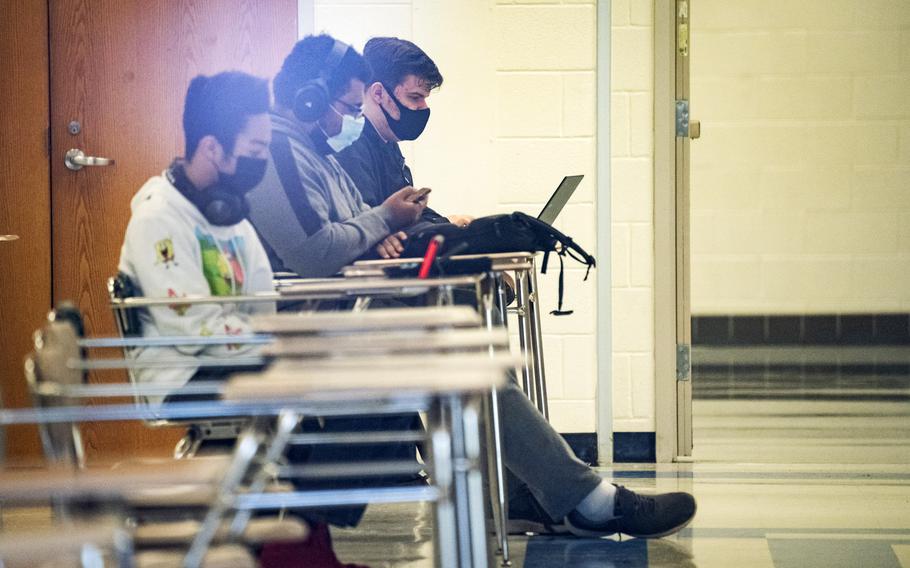 Students sit in a cafeteria at Sherwood High School in Sandy Spring, Md., this spring. Montgomery County Schools recently added three early release days to the calendar, citing the need for teacher professional development and planning time. 