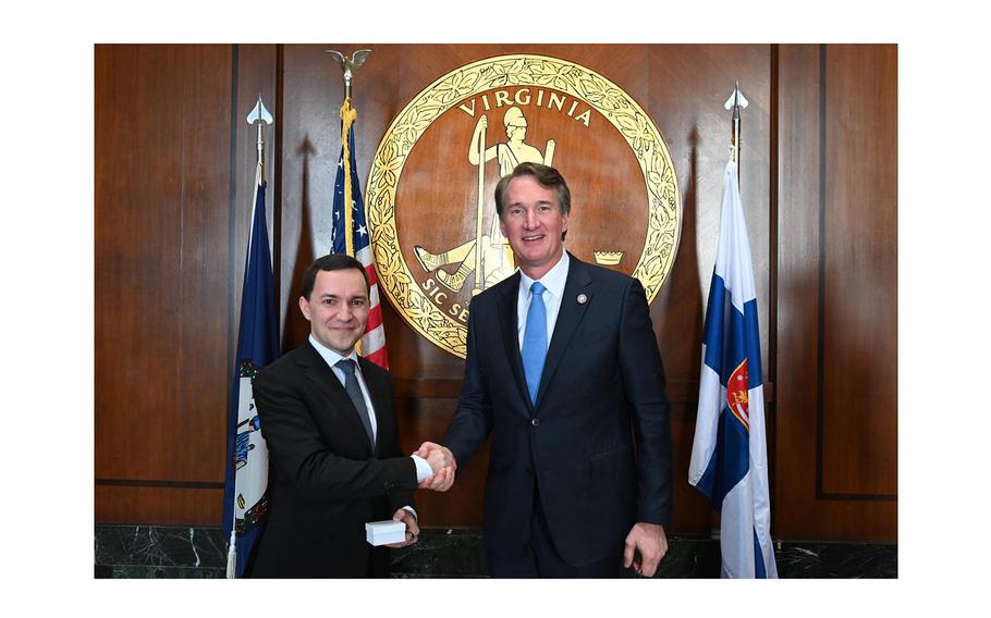 Finland’s Minister of Economic Affairs Wille Rydman shakes hands with Virginia Gov. Glenn Youngkin in Richmond as they met to discuss opportunities to deepen the Finnish-Virginian collaboration in shipbuilding and port security.