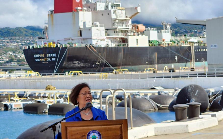 Sen. Mazie Hirono, R-Hawaii, speaks at Joint Base Pearl Harbor-Hickam, Friday, Oct. 13, 2023, flanked by the merchant tanker Empire State, which will be used to carry fuel being emptied from the Red Hill Bulk Fuel Storage Facility.
