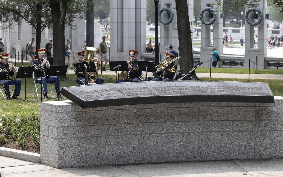 sample remembrance day speech The U.S. Army Brass Quintet plays behind the new FDR prayer plaque at the National World War II Memorial in Washington, D.C., on the 79th anniversary of the start of the D-Day invasion, Tuesday, June 6, 2023.