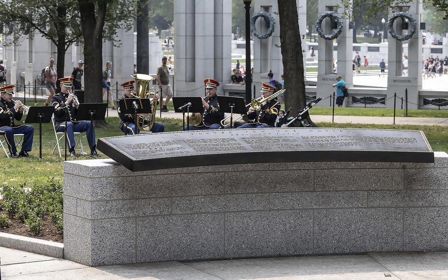 The U.S. Army Brass Quintet plays behind the new FDR prayer plaque at the National World War II Memorial in Washington, D.C., on the 79th anniversary of the start of the D-Day invasion, Tuesday, June 6, 2023.