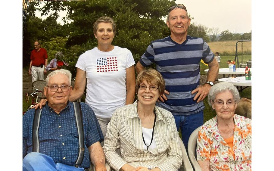 Hubert and June with their children: From top left, Jo and Sam, and Theresa, center. 