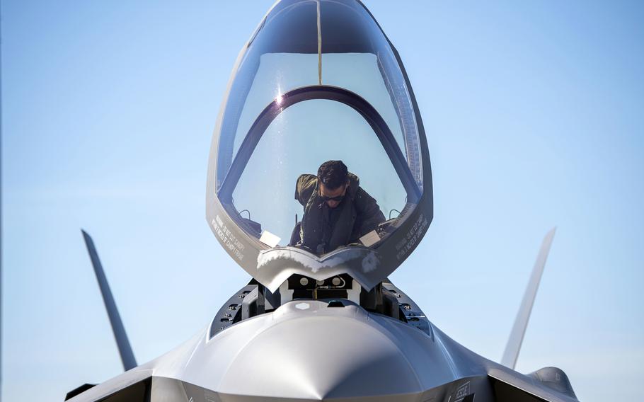 An F-35A Lightning II pilot assigned to the 354th Fighter Wing at Eielson Air Force Base, Alaska, climbs into the cockpit at Tyndall Air Force Base, Fla., Oct. 15, 2021. 