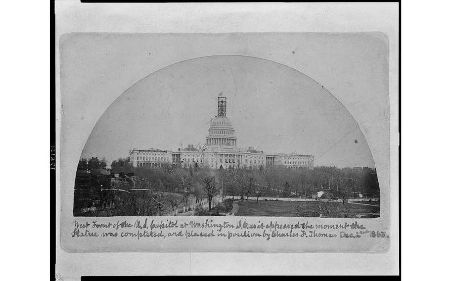 The U.S. Capitol the day the final piece of the Statue of Freedom was placed atop the dome, Dec. 2, 1863. It is not known whether Philip Reed, the enslaved man who played an integral role in its creation, was there to see it.