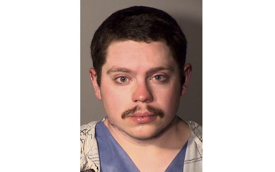 This photo, provided by the New London, Conn., Police Department, shows George Bryan Dodson II. Dodson, a 23-year-old submariner, who waived his right to a probable cause hearing on Monday, Aug. 15, 2022, pleaded not guilty to charges including murder, attempted murder, arson and cruelty to animals in connection with the July 20, 2022, death of his wife, 23-year-old Shelby Dodson.