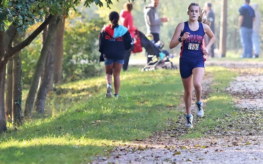 Aviano’s Autumn Thomas sprints to the finish line of the DODEA South cross country championships Saturday, Oct. 23, 2021, at Lago di Fimon, Italy. Thomas won the race in 20 minutes, 32 seconds. 