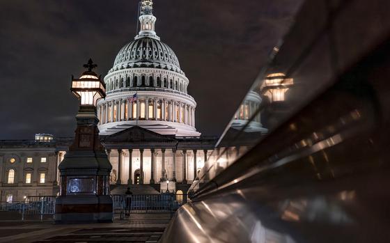 The Capitol is seen late Tuesday night, Sept. 26, 2023, in Washington, as lawmakers work to advance appropriations bills on the House floor. The Republican-controlled House and the Democrat-controlled Senate are starkly divided over very different paths to preventing a federal shutdown. (AP Photo/J. Scott Applewhite)