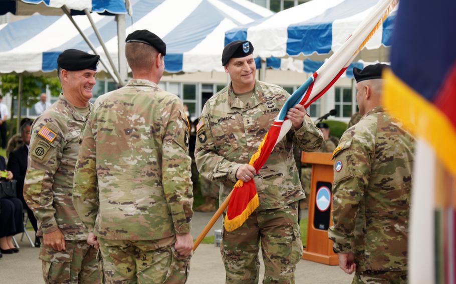 Maj. Gen. David Womack takes command of U.S. Army Japan from Maj. Gen. Joel "JB" Vowell at Camp Zama, Japan, Tuesday, June 20, 2023. The ceremony was overseen by Gen. Charles Flynn, far left, commander of U.S. Army Pacific. 