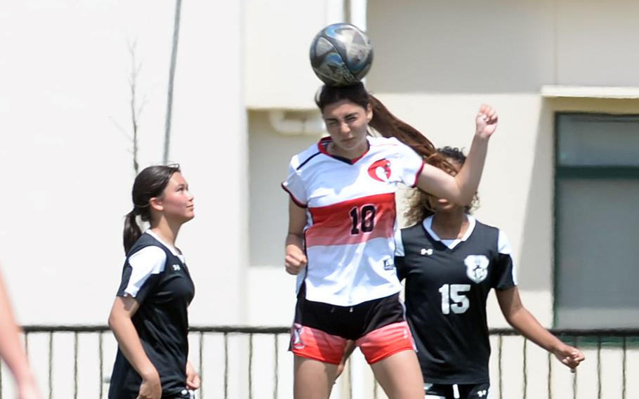 Joanna Hall heads the ball.