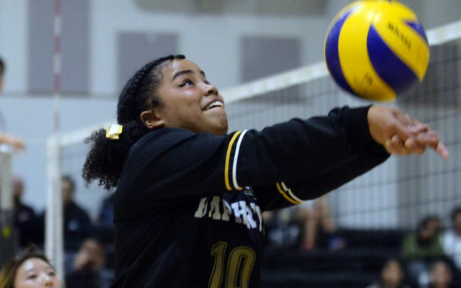 Humphreys' Nyomi Peoples bumps the ball against Chadwick International during Wednesday's Korea girls volleyball match. The Dolphins beat the Blackhawks in four sets.