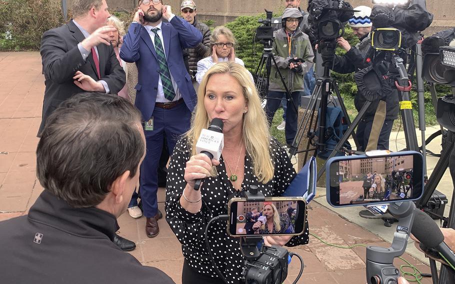 Rep. Marjorie Taylor Greene, R-Ga., speaks to reporters Friday after touring the D.C. jail in response to complaints that defendants in the Jan. 6, 2021, riot are being treated poorly there. 