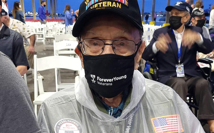 Richard Schimmel, 99, who was stationed at Fort Shafter, Hawaii, on Dec. 7, 1941, awaits the start of a ceremony at Joint Base Pearl Harbor-Hickam, Tuesday, Dec. 7, 2021, marking the 80th anniversary of the surprise attack.