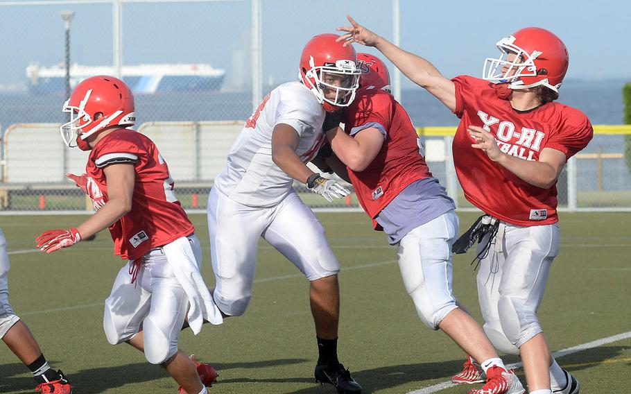 Zeke DeLaughter, a senior transfer from South Carolina, is Nile C. Kinnick's new starting football quarterback.