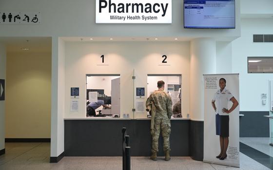 A customer uses the pharmacy Oct. 4, 2022 at Ramstein Air Base, Germany. The Defense Health Agency is shuttering the location in the base mall, a little over two years since spending $3.2 million on its opening.