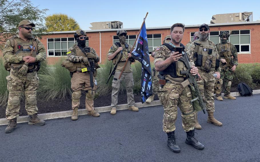 Members of the Virginia Kekoas stage a Second Amendment demonstration in Gloucester, Va., in August 2023. Russell Vane IV, second from left, was later removed from the militia group over statements about explosives.
