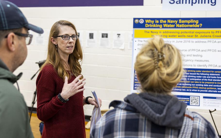 Jennifer Corack explains why the Navy is sampling drinking water for per- and polyfluoroalkyl substances, also known as PFAS, in certain areas of the United States during an open house at Treakle Elementary School in Chesapeake, Va., on Tuesday, Feb. 6, 2024. 