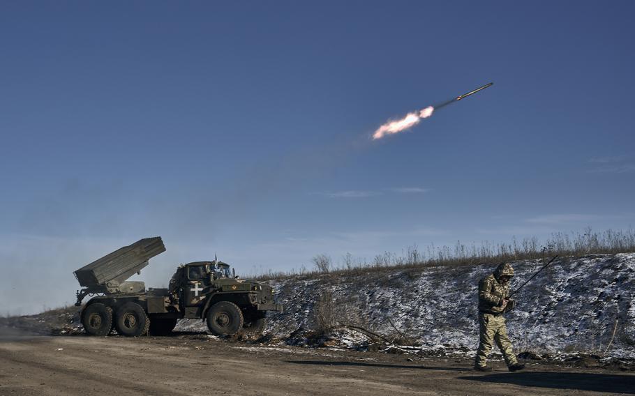 A Ukrainian army Grad multiple rocket launcher fires rockets at Russian positions in the frontline near Soledar, Donetsk region, Ukraine, on Wednesday, Jan. 11, 2023.
