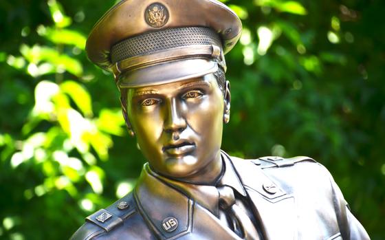 A statue of Elvis Presley, paid for by fans, stands on a bridge in a park in Bad Nauheim, Germany, where the American singer lived from 1958-1960 when he served in the Army. 