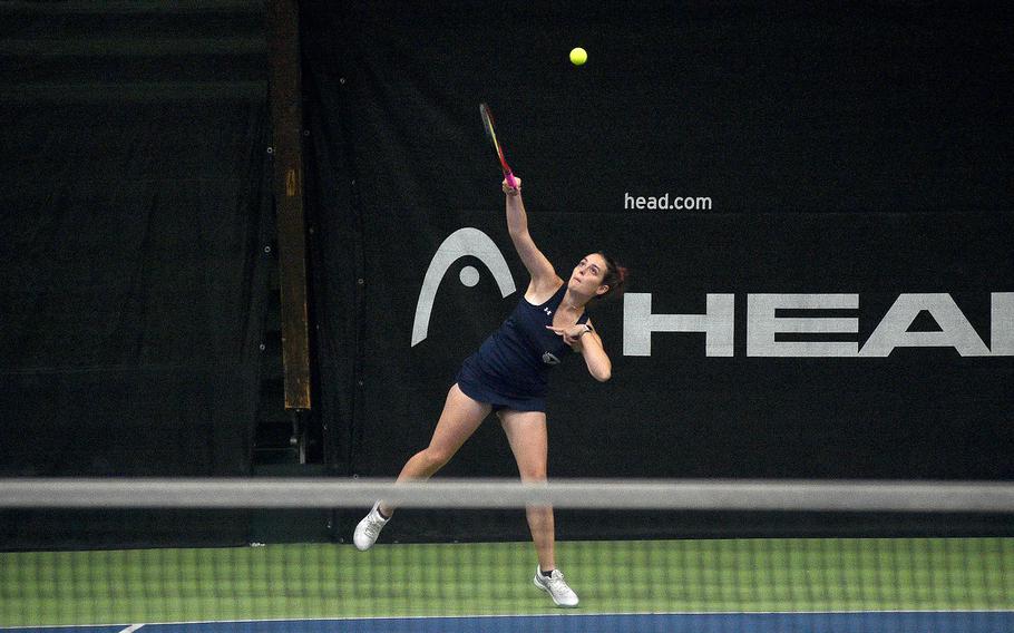 Lakenheath’s Maddison Beedham serves during a match between herself and fellow Lancer Elisabeth Petrich and Stuttgart’s Gracey Basgall and Allison Hayes in pool-play action of the DODEA European tennis championships on Oct. 19, 2023, at T2 Sports Health Club in Wiesbaden, Germany.