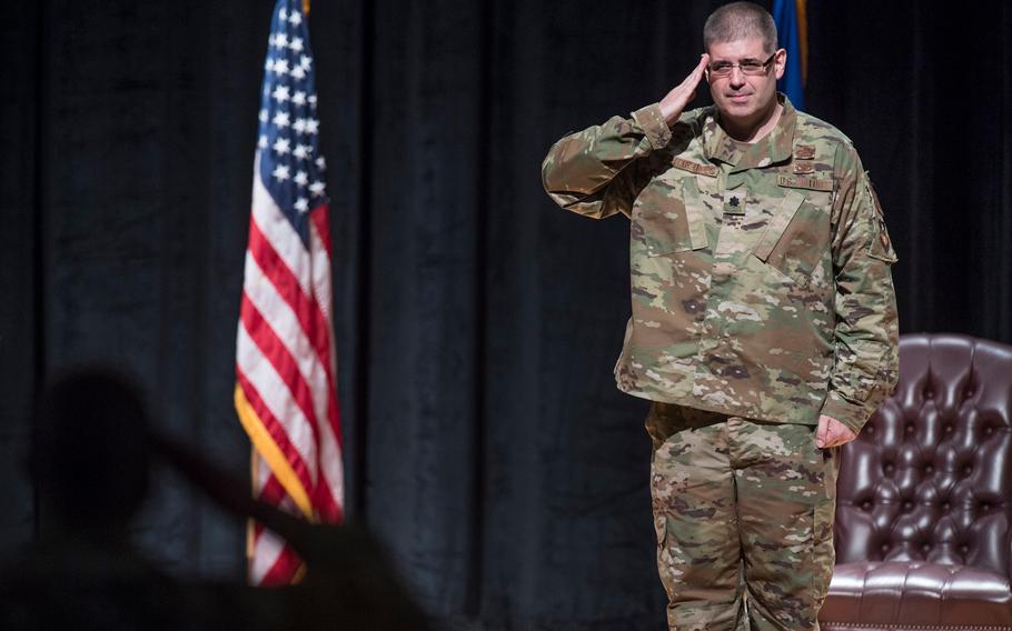 Air Force Lt. Col. Jamie Humphries returns the ceremonial first salute to a formation of airmen on June 11, 2020, at Joint Base Charleston, S.C.  Humphries was relieved as commander of the 1st Combat Camera Squadron on Tuesday, April 19, 2022, due to the unit’s poor command climate, service leaders said.