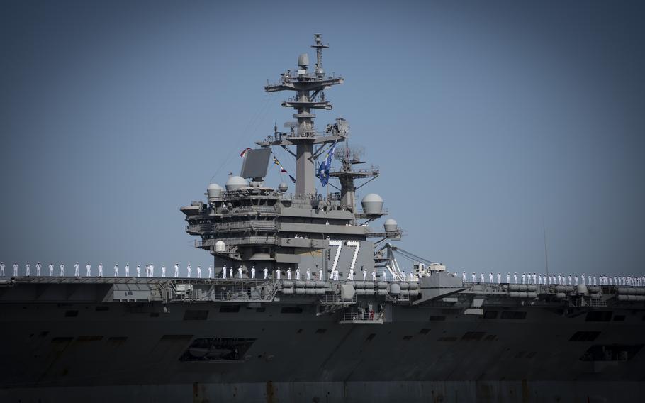 The USS George H.W. Bush, along with the staff of carrier Strike Group 10, returns to Naval Station Norfolk following an eight-month deployment, Sunday, April 23, 2023. 