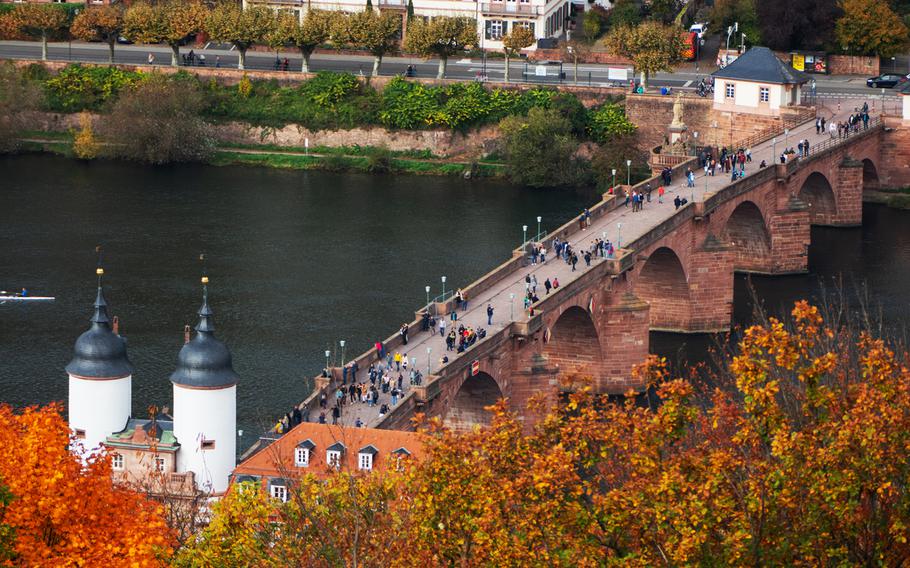 View of the Alte Bruecke from the terrace at the restaurant of the Molkenkur, a hotel on a hill above the Old Town, Heidelberg. 