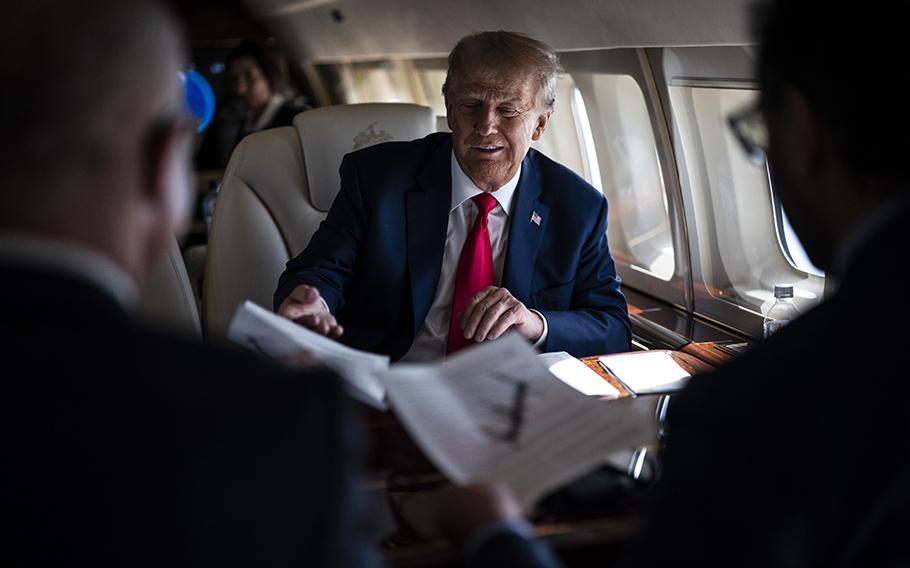 Former President Donald Trump speaks to staff and reporters aboard his airplane on June 10, 2023. “I don’t need banks,” Trump said in April. “I have a lot of cash. I built a great business with my family.” 