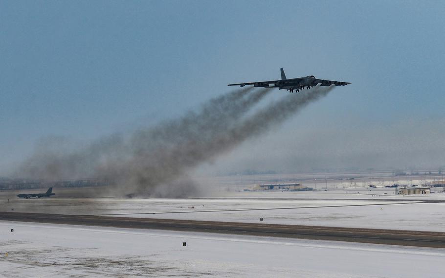 A B-52 bomber takes off from Minot Air Force Base, N.D., Jan. 9, 2024. 