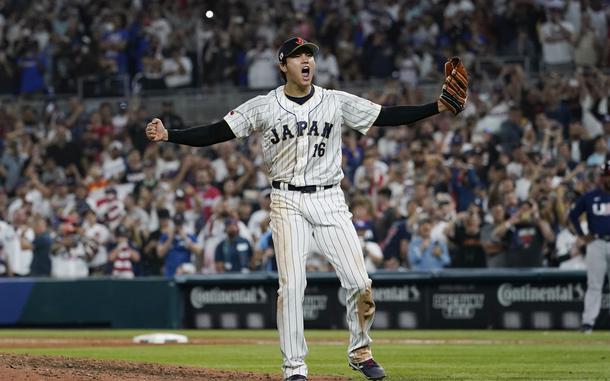 Japan pitcher Shohei Ohtani (16) celebrates after defeating the United States at the World Baseball Classic final game, Tuesday, March 21, 2023, in Miami.