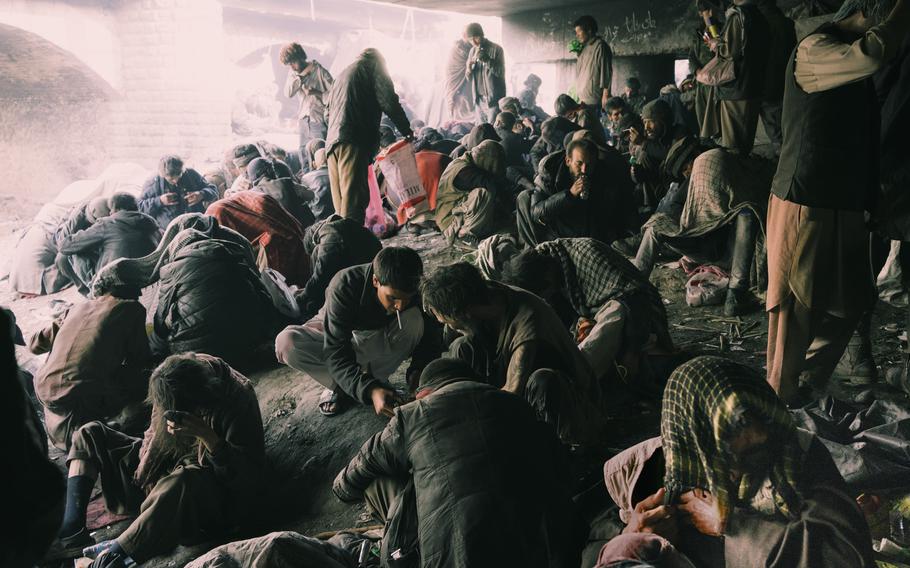 Afghans gather under a bridge in Kabul to buy and use drugs. Meth addiction is increasing, and drug treatment centers are overwhelmed.