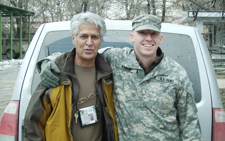 Jason Kander, right, with interpreter Salam Rauffi in Afghanistan in 2007. 