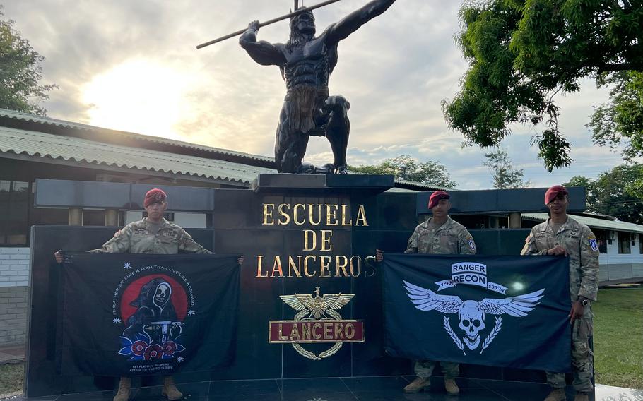 Sgt. Angel Partidas, Staff Sgt. Raymond Colon and Sgt. Darwin Guevara, from left, celebrate their graduation from Lancero School in Tolemaida, Colombia, on Nov. 29, 2023.