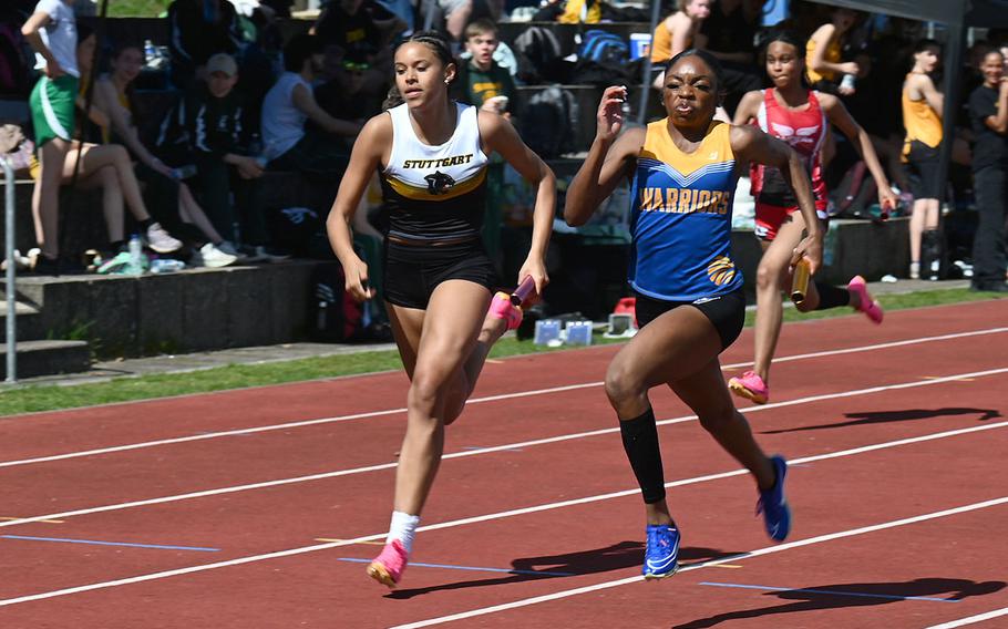 Makiah Parker, a senior at Wiesbaden High School, takes the lead in the 4x100 meter relay’s last leg during the Ansbach Invitational track meet at Ansbach Middle High School, Germany, on Saturday, April 6, 2024. 