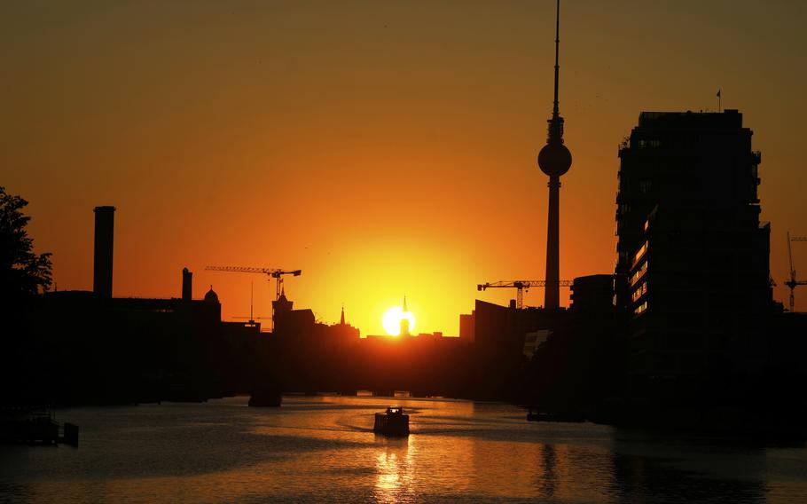 The Television Tower silhouettes in the sunset on a day with hot summer weather in Berlin, Germany, Tuesday, July 1, 2025. 