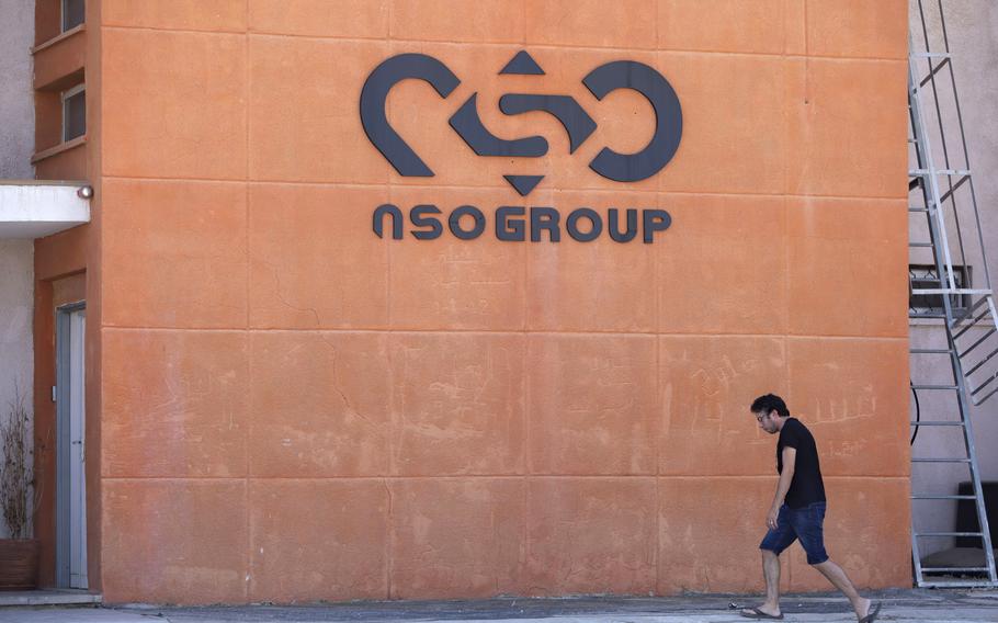 A logo adorns a wall on a branch of the Israeli NSO Group company, near the southern Israeli town of Sapir, Aug. 24, 2021. European Parliament members investigating the use of surveillance spyware by European Union governments sharply criticized Israel on Wednesday, Sept. 21, 2022, for a lack of transparency in allowing the sale of powerful Israeli spyware to European governments that have used it against critics. 