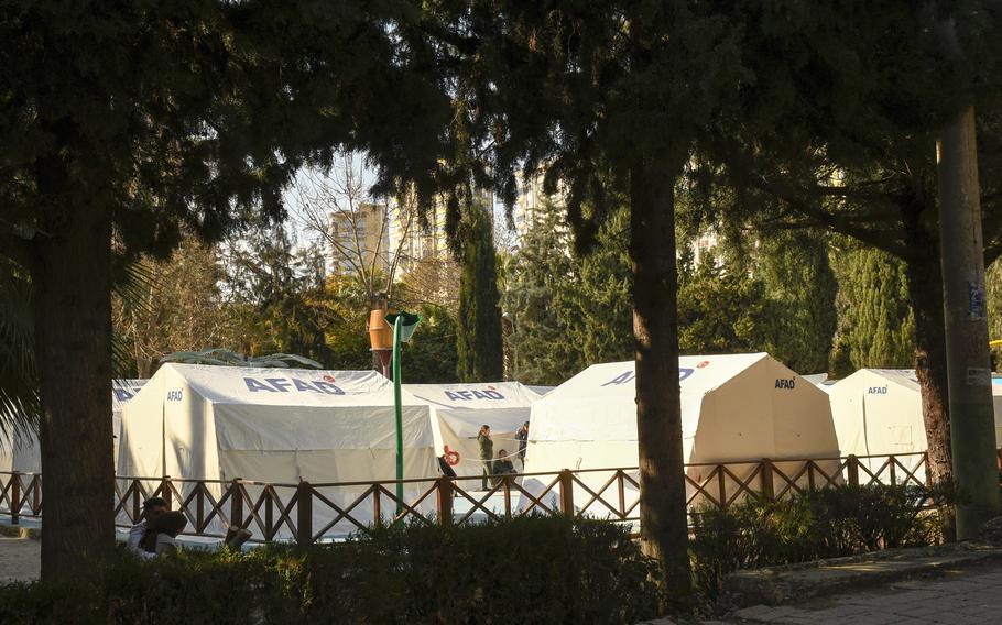 A cluster of tents from Turkey’s national disaster management agency stand in the center of a park in downtown Adana, Turkey, on Feb. 25, 2023. More than 1 million people in Turkey are living in tents following the Feb. 6 earthquakes, Turkish Vice President Fuat Oktay told reporters recently.
