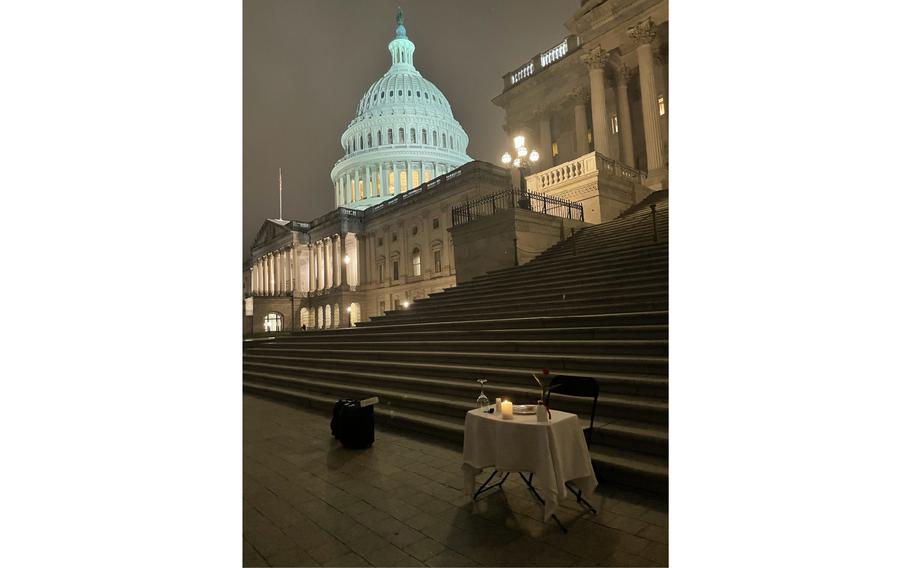 A “missing man’s table” commemorating fallen U.S. service members was set near the Capitol steps.