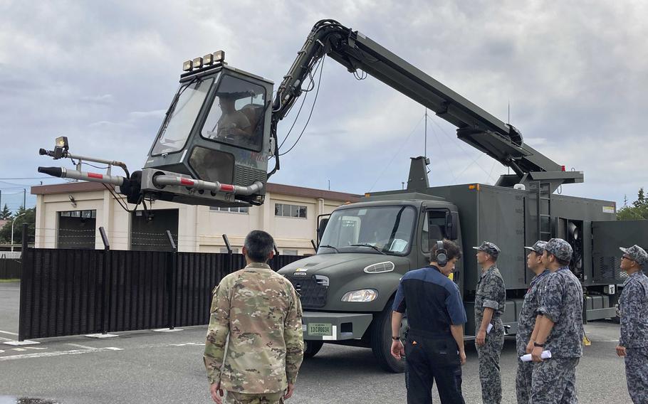 Air Force mechanics teach Japanese airmen about the Global Deicer at Yokota Air Base, Japan, Thursday, Sept. 7, 2023. 