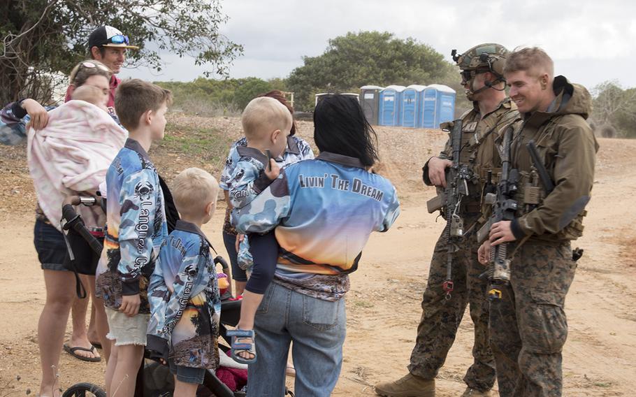 U.S. Marines chat with locals during Talisman Sabre training near Stanage Bay, Australia, Wednesday, Aug. 2, 2023. 