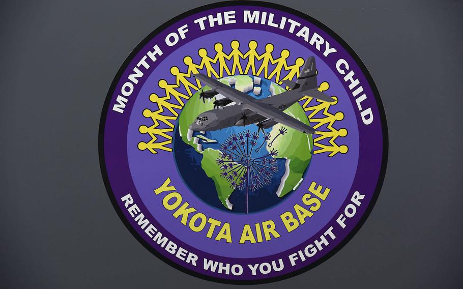 The home of U.S. Forces Japan marked the Month of the Military Child this week by unveiling a student-designed morale patch featuring a dandelion and a C-130J airlifter. 