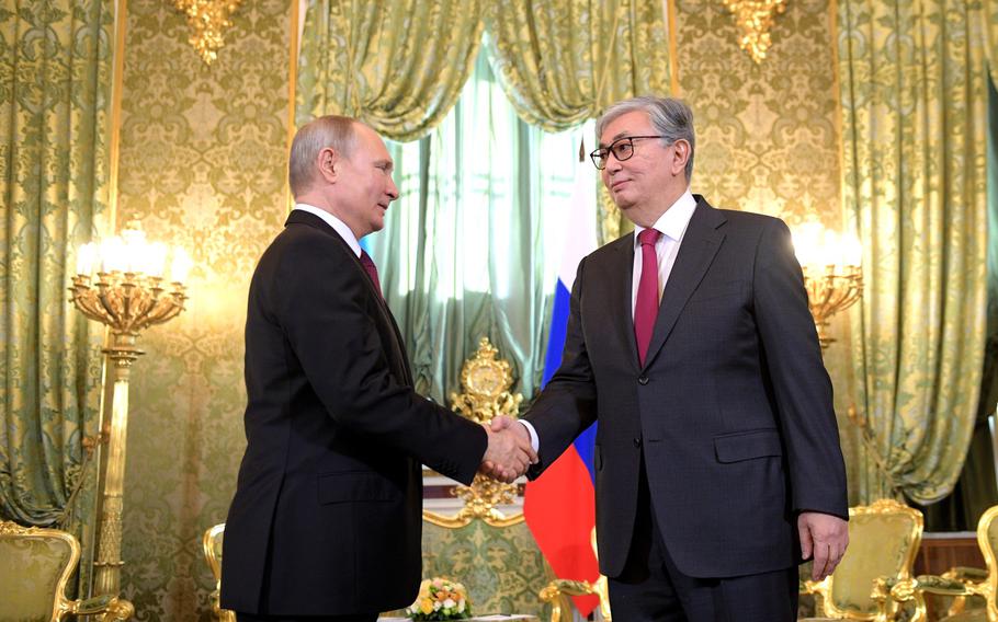 Russian President Vladimir Putin shakes hands with the president of Kazakhstan, Kassym-Jomart Tokayev, on April 3, 2019.