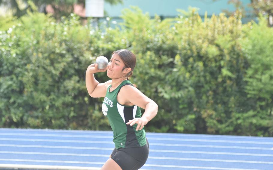 Naples' Cassidy Santiago tosses the shot put Saturday, April 29, 2023, at a DODEA-Europe meet in Pordenone, Italy. She finished second.